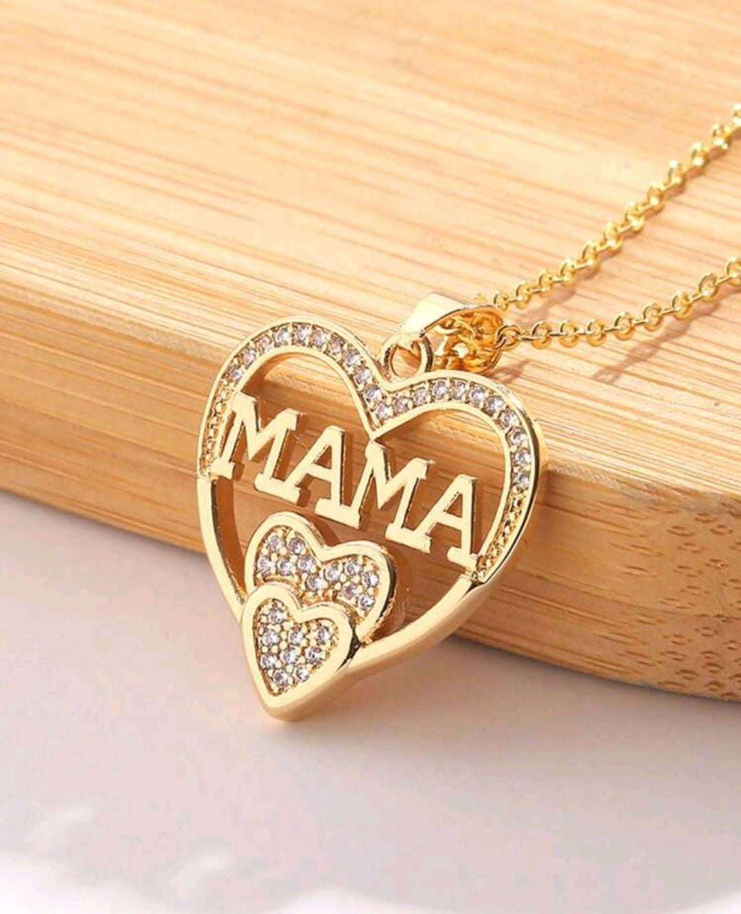 Gold-colored necklace, Mom